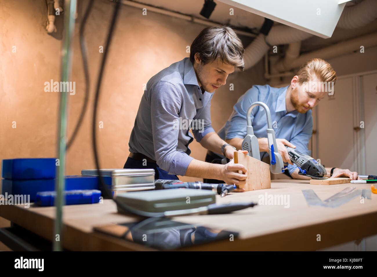Two designers working on a project Stock Photo - Alamy