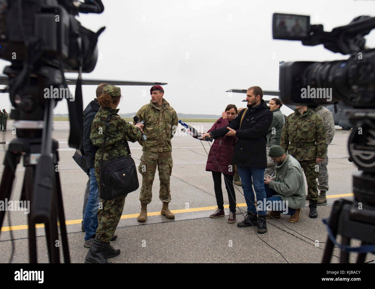 Serbian media representatives interview a U.S. Soldier assigned to the ...