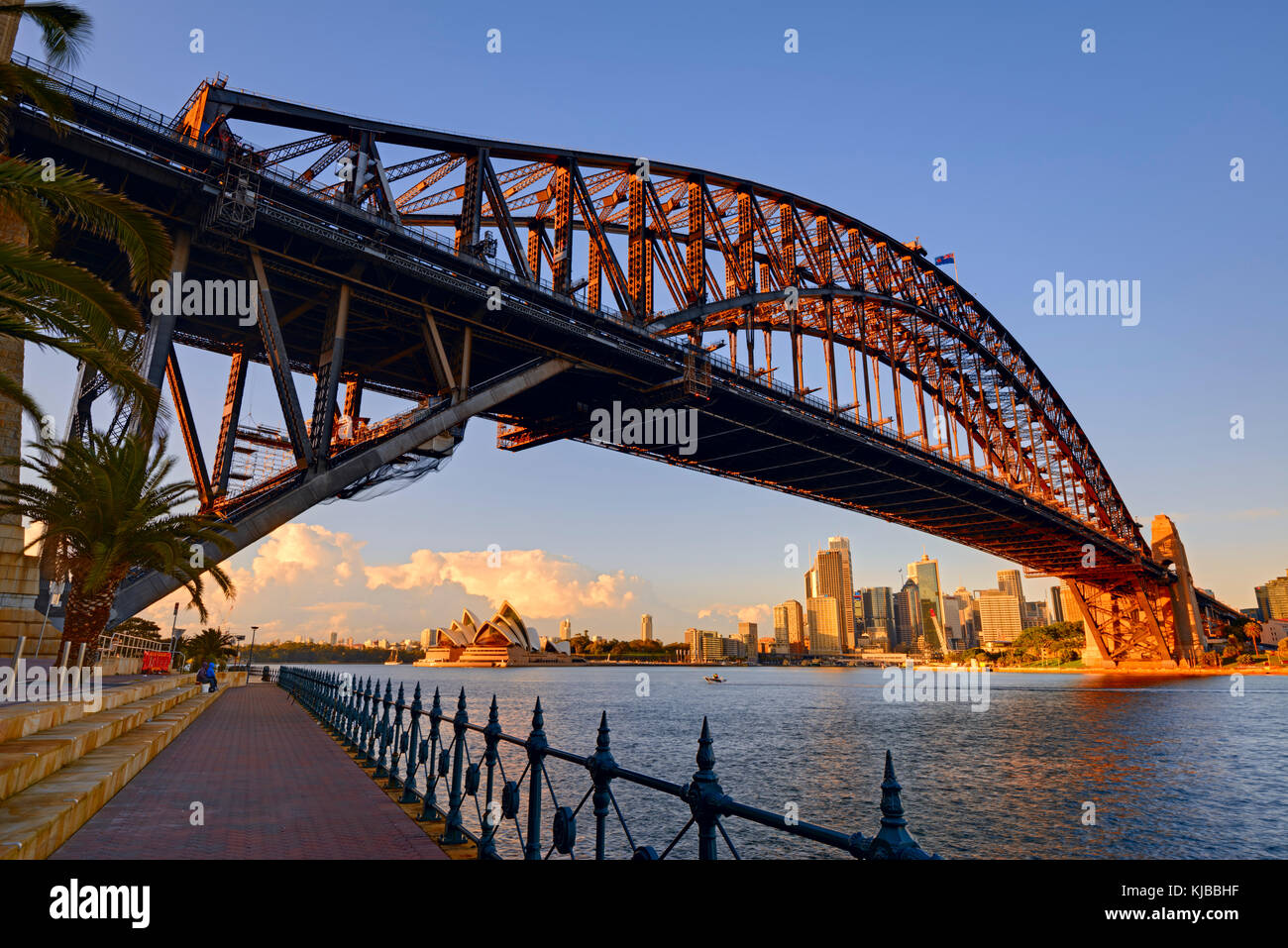 Harbour Bridge and the Sydney Opera House from Luna Park in Milsons Point, Sydney, New South Wales (NSW), Australia at sunrise. Stock Photo