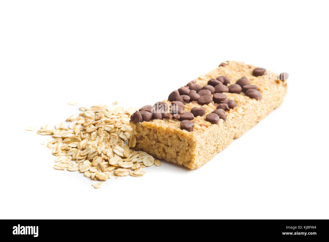 Oat protein bar and oat flakes isolated on white background. Stock Photo