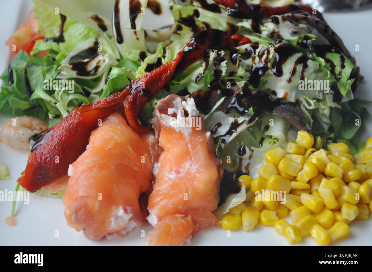 Dressed salad with lettuce and salmon Stock Photo