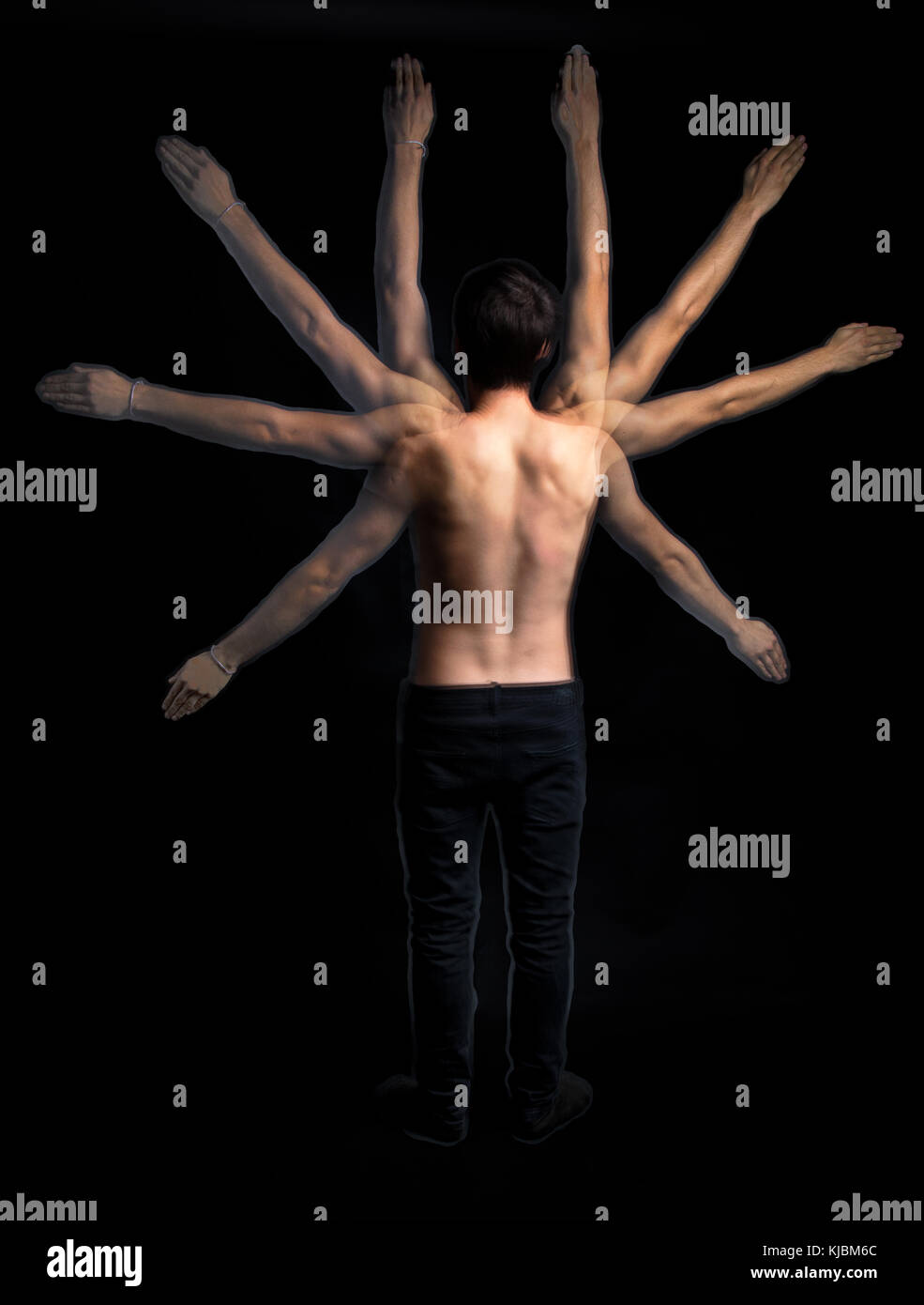 stroboscobic flash photography, young man back body moving arms with multiple exposure, vintage photo technique Stock Photo