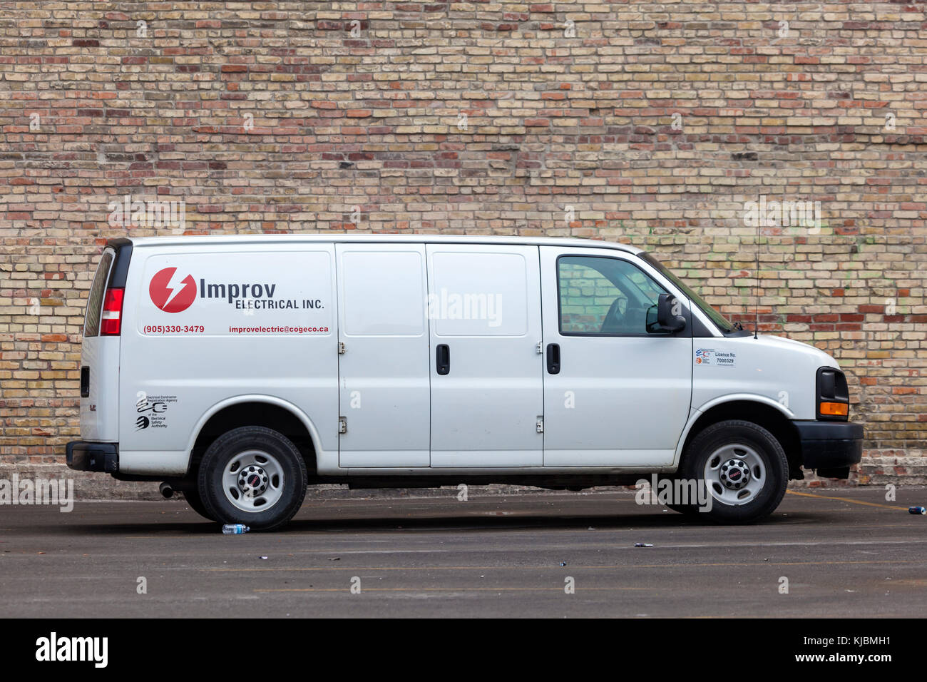 Toronto, Canada - Oct 14, 2017: A white GMC cargo van parked on a parking lot in the city of Toronto, Canada Stock Photo