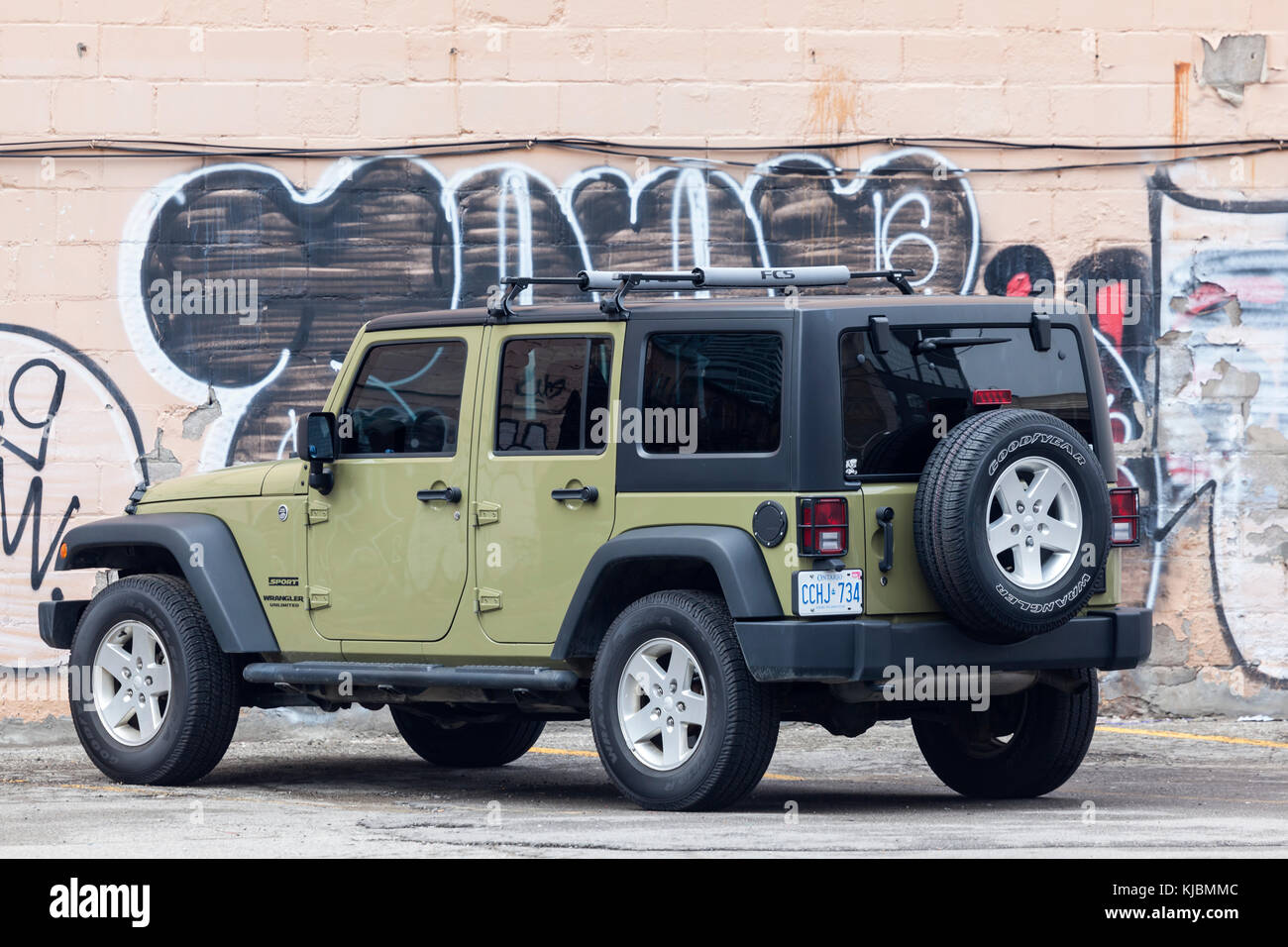 Toronto, Canada - Oct 14, 2017: Jeep Wrangler Sport Unlimited with a  hardtop on a parking lot in the city of Toronto Stock Photo - Alamy