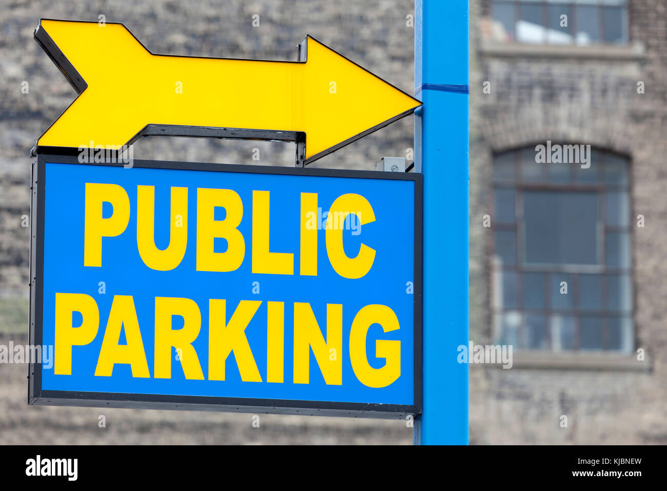 Blue and yellow public parking sign Stock Photo Alamy
