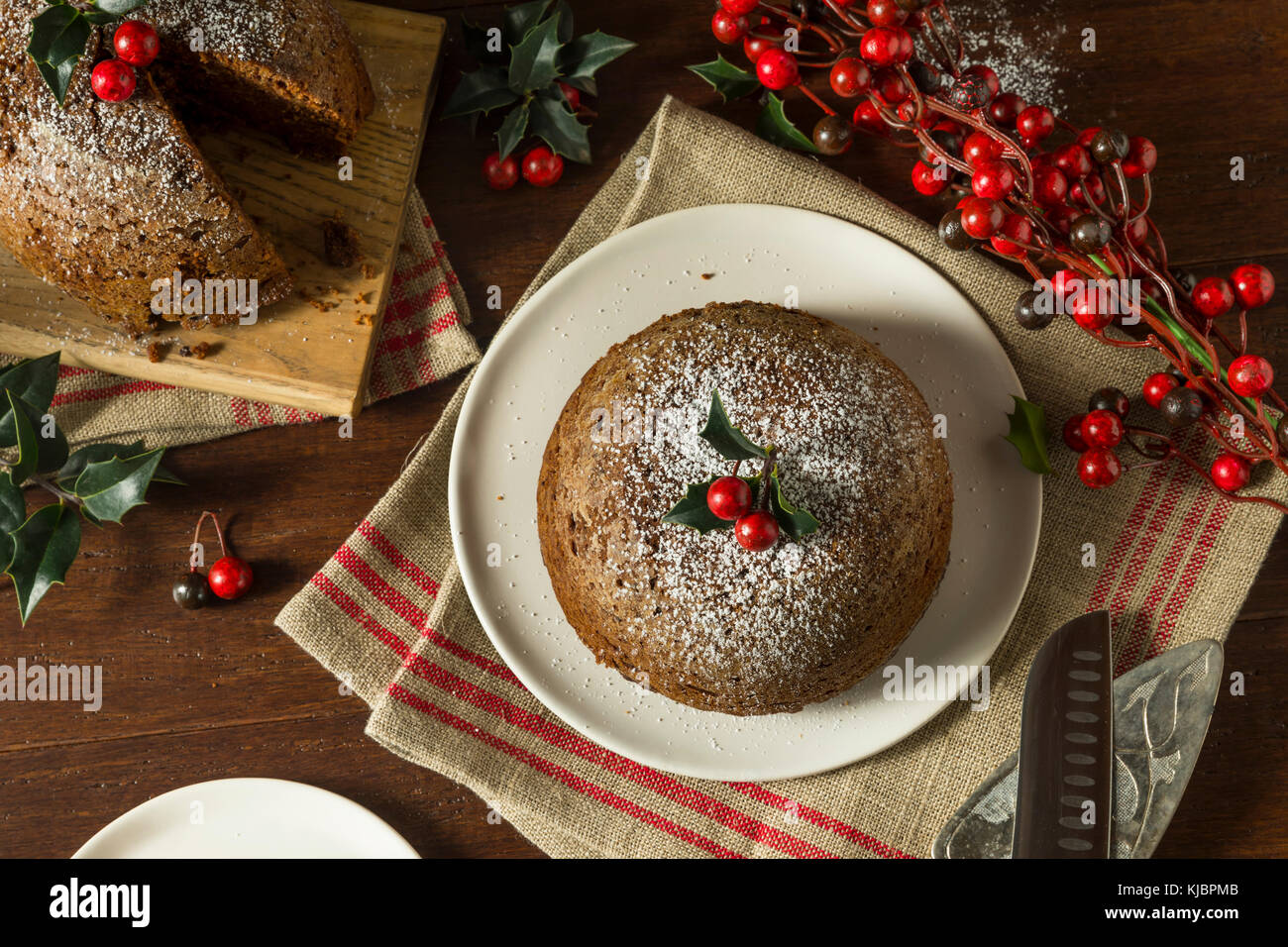 Sweet Homemade Christmas Figgy Pudding with Powdered Sugar Stock Photo