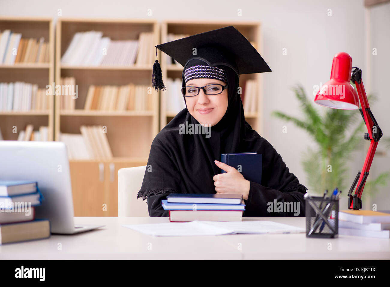 Muslim girl in hijab studying preparing for exams Stock Photo - Alamy