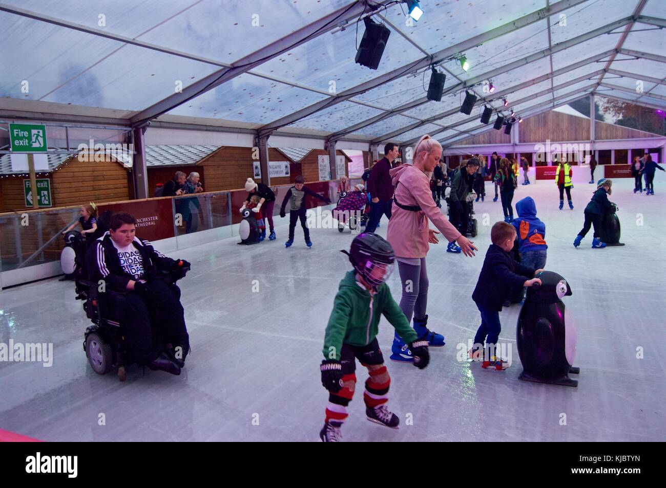 Ice skating at Winchester Christmas Market, including disabled group