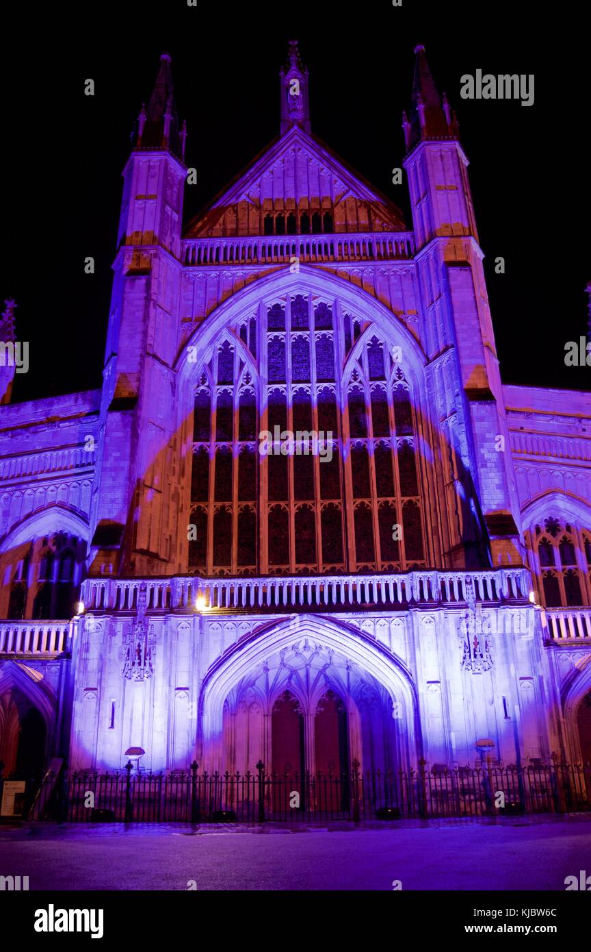 Winchester Cathedral exterior lit up at night, Christmastime, UK Stock Photo