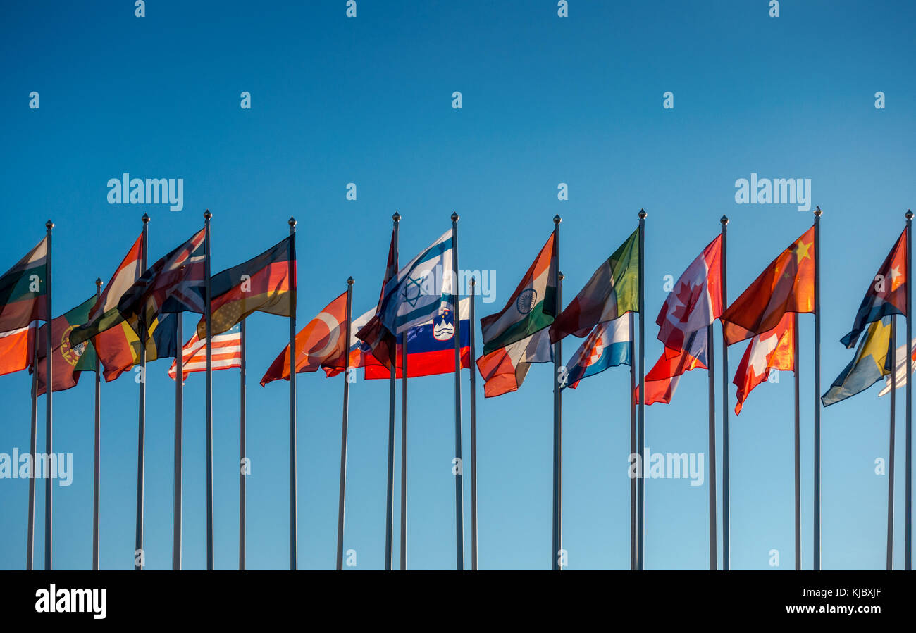 Flags of the world on the background of blue sky Stock Photo - Alamy