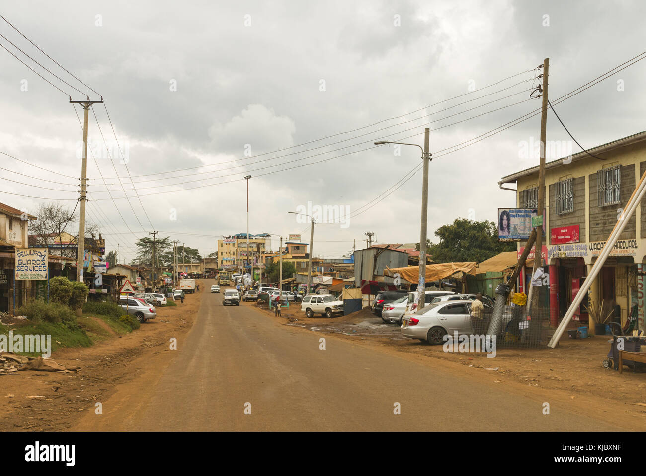 Gachie town main road with shops and people lining the road, Kenya, East Africa Stock Photo