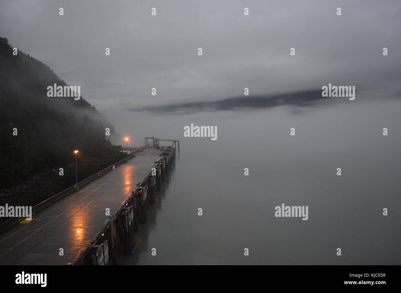 Alaska port on a foggy morning Stock Photo - Alamy