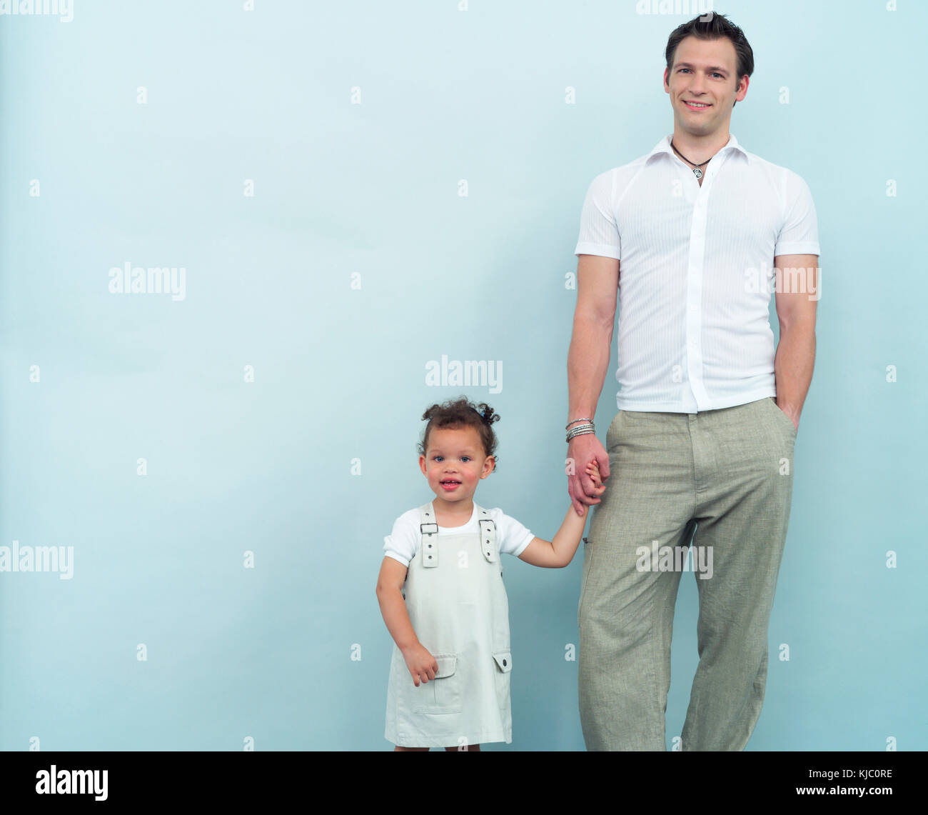 Father and Daughter Holding Hands Stock Photo - Alamy