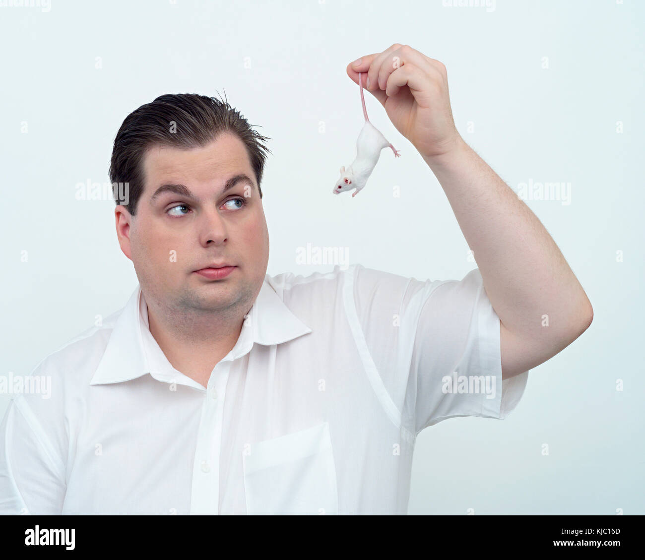 Man Holding Mouse Stock Photo - Alamy
