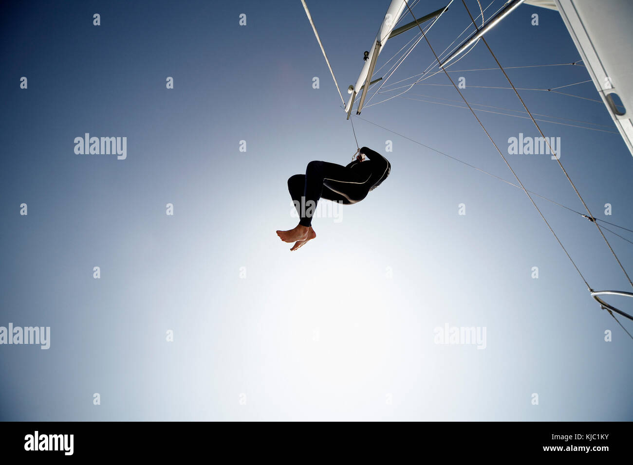 Man Jumping off Boat Stock Photo Alamy