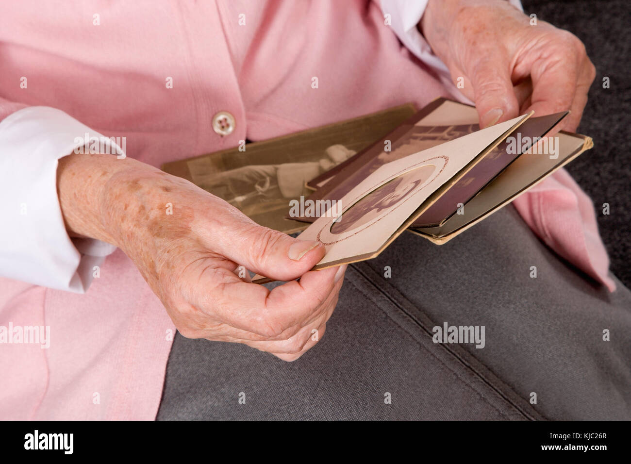 Woman Holding Old Photographs Stock Photo Alamy