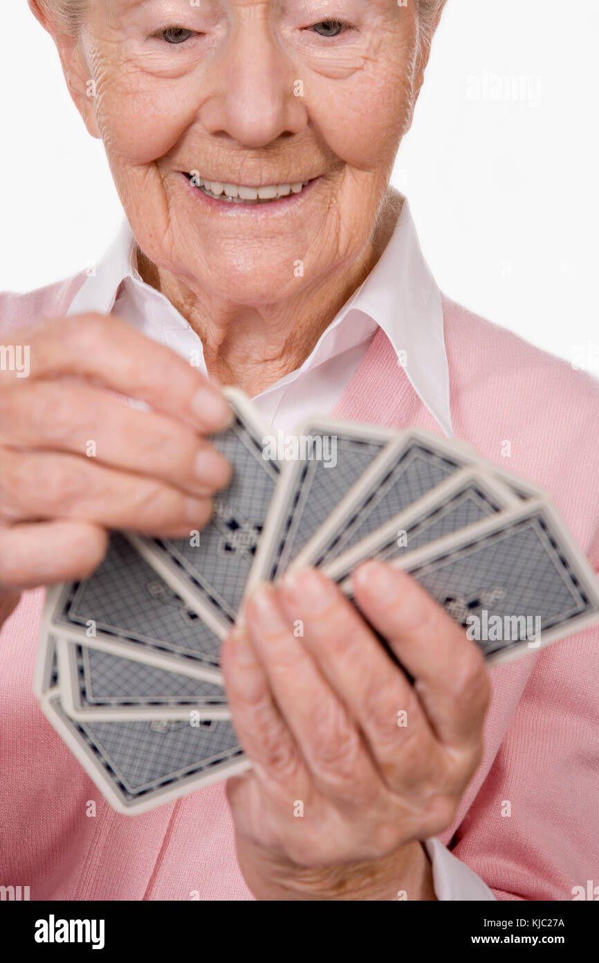 Woman holding cards Stock Photo Alamy