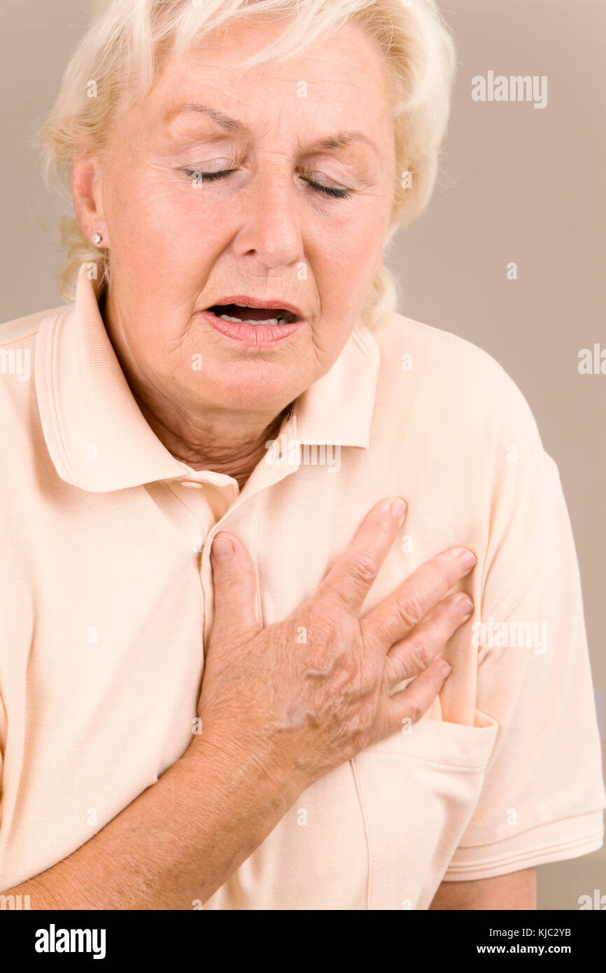 Woman With Chest Pain Stock Photo Alamy