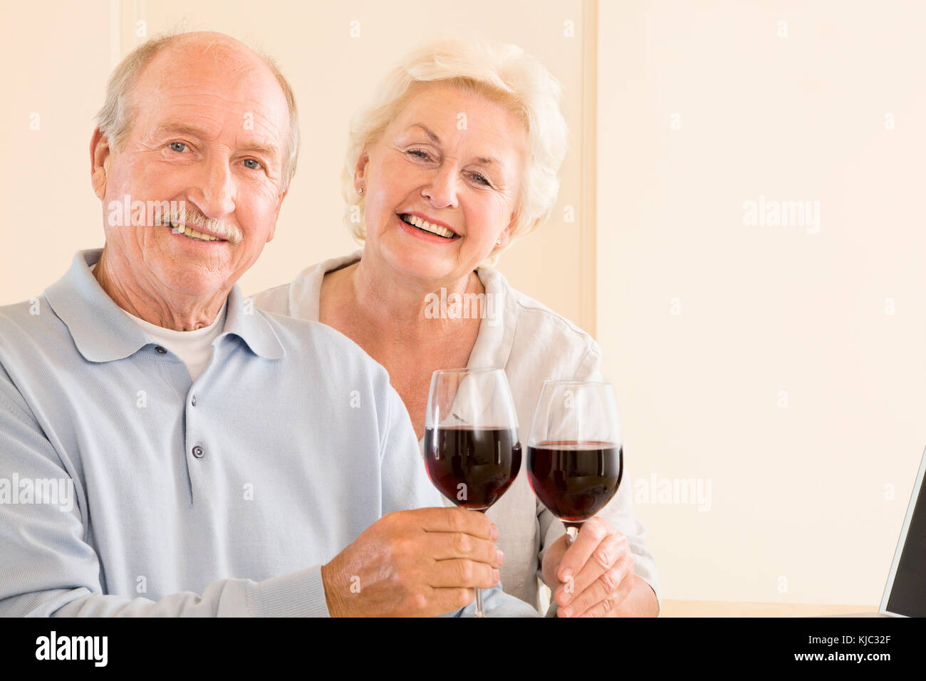 Portrait of Couple with Red Wine Stock Photo - Alamy