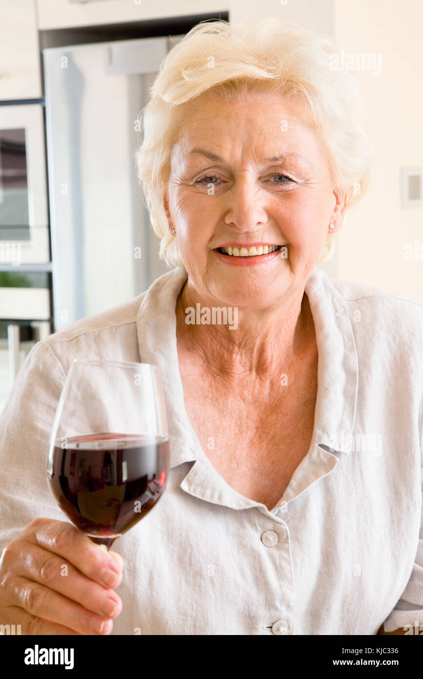 Portrait of Woman with Glass of Wine Stock Photo - Alamy