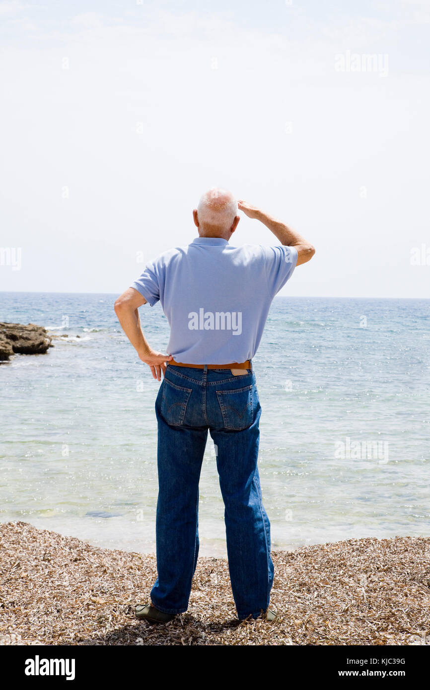 Man Looking Out to Sea Stock Photo - Alamy