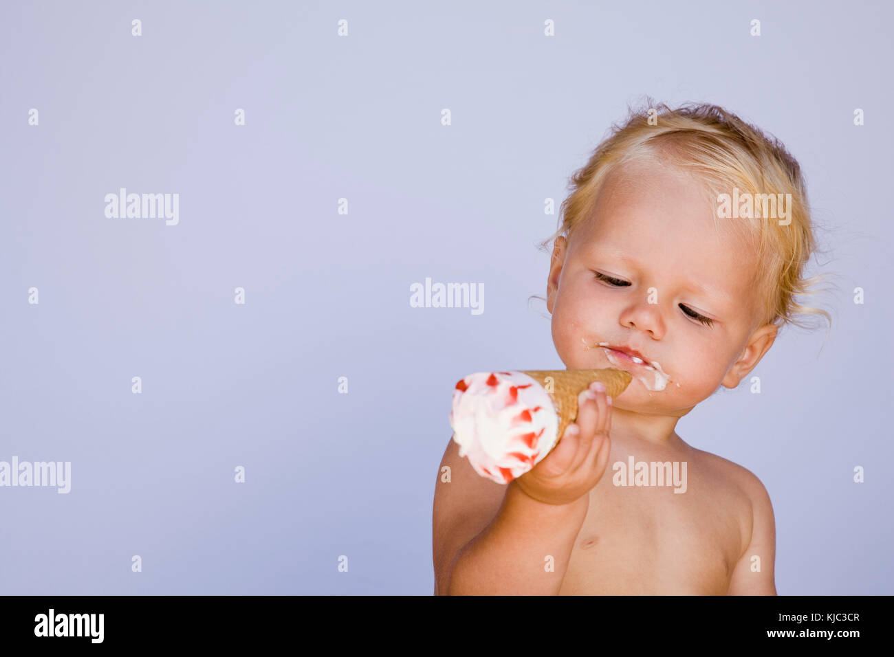 Baby Eating Ice Cream Cone Stock Photo Alamy