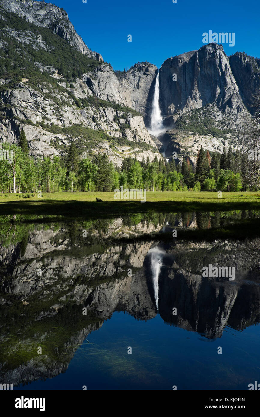 Yosemite Falls reflected in Merced River in Yosemite National Park in California, USA Stock Photo