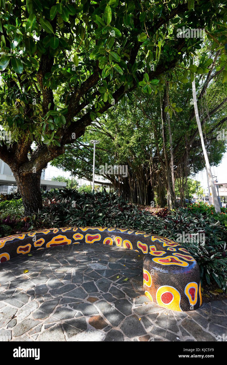 Mosaic Aboriginal artwork on a bench shaped as a snake in Shields Street, Cairns, Far North Queensland, FNQ, QLD, Australia Stock Photo