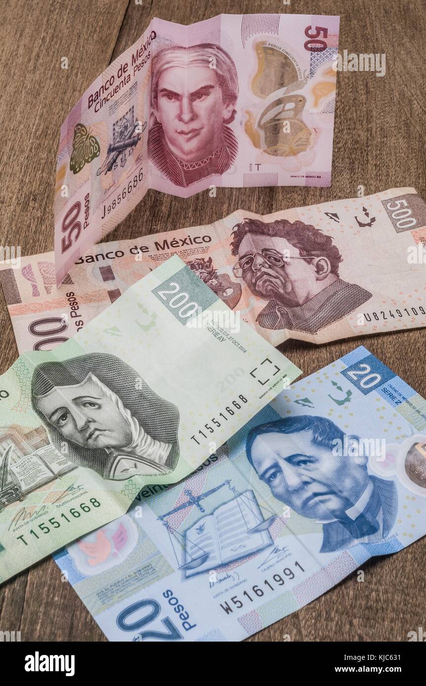 20, 50, 200 and 500 mexican pesos bills appear to be sad. Stock Photo