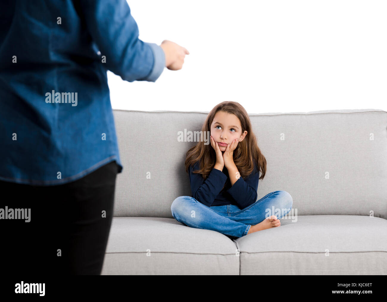 Grown up rebuking a little child for bad behavior Stock Photo