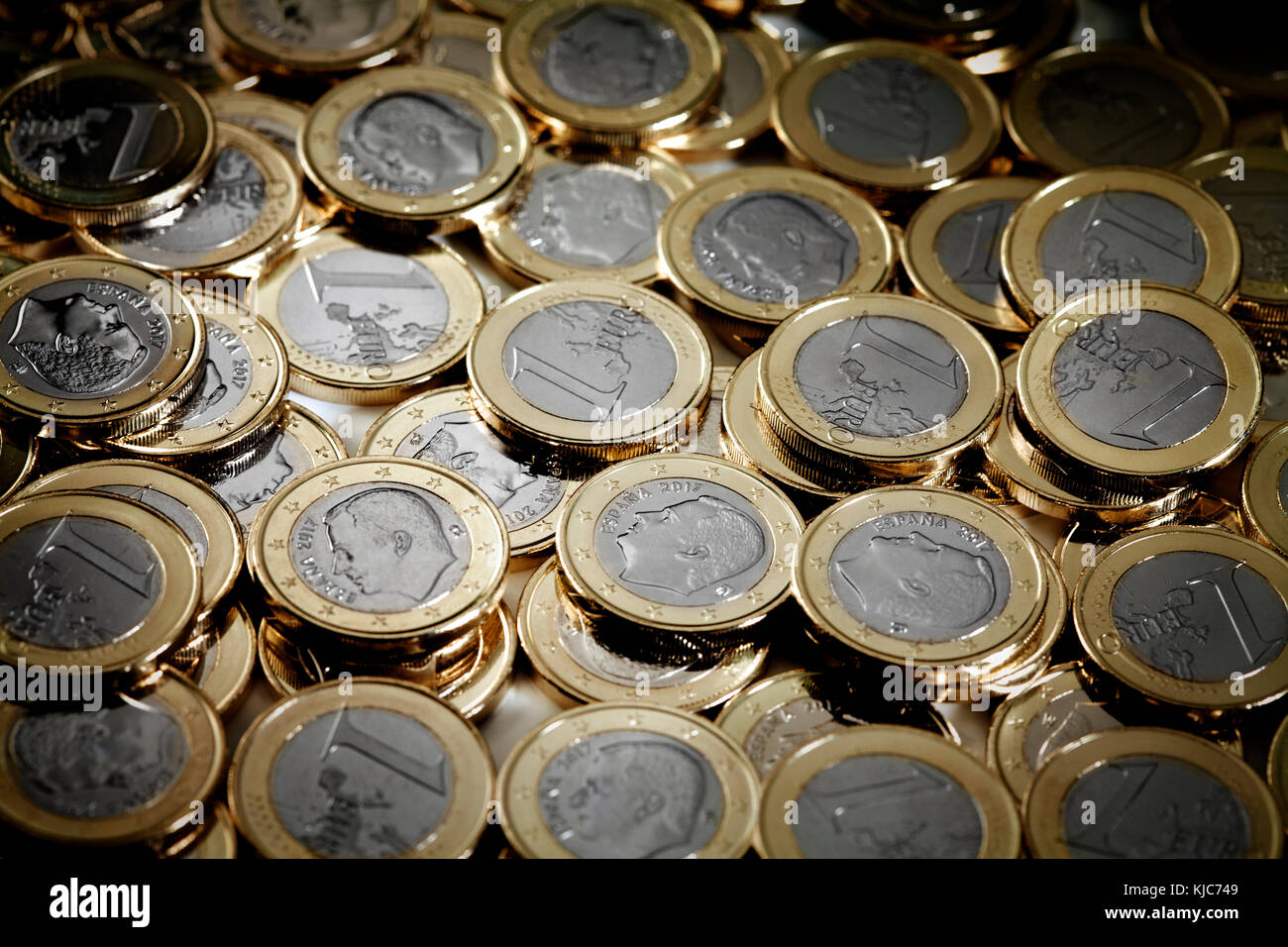 Heap of one euro coins. Spanish edition of new one euro coins. Stock Photo