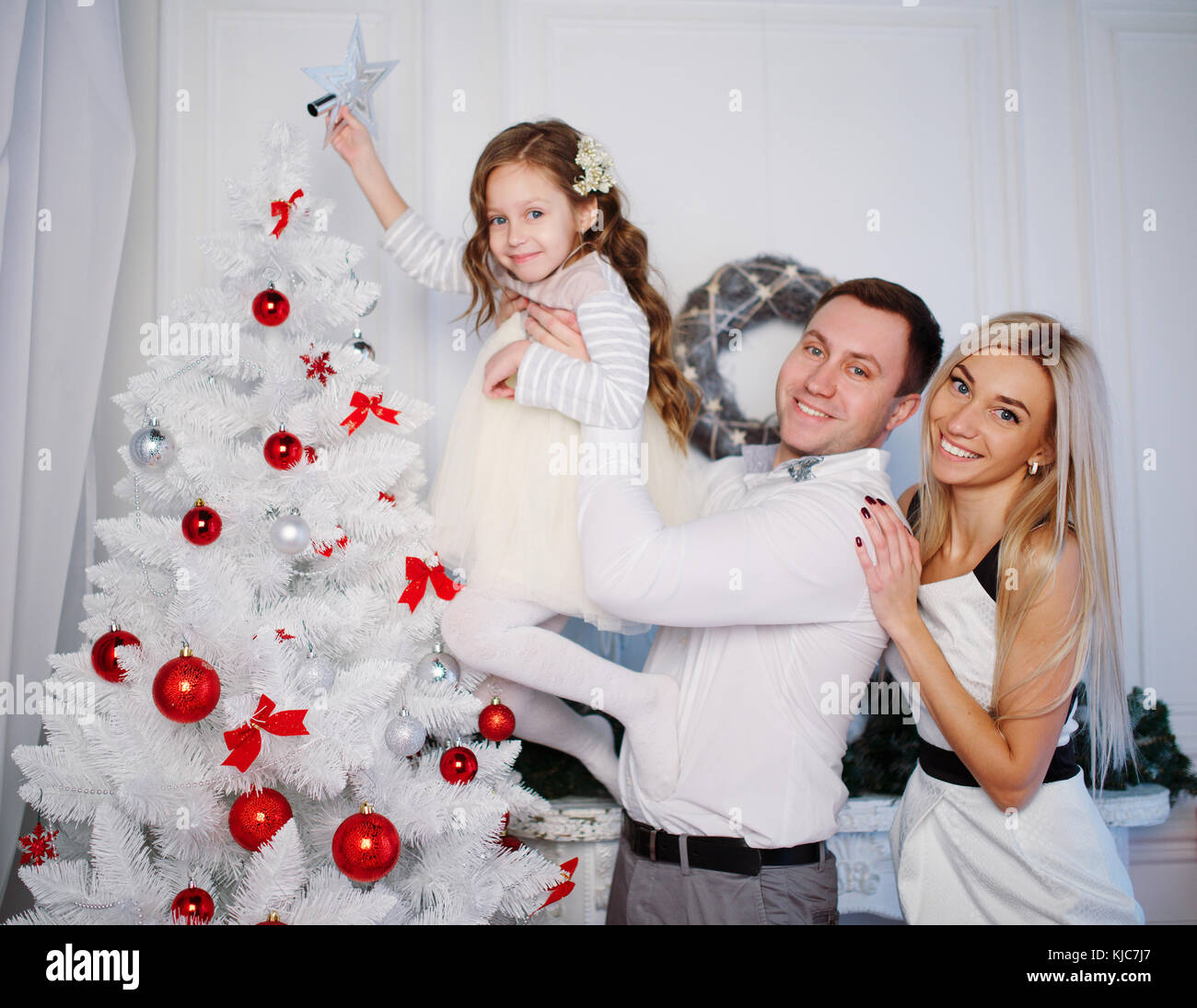 photo of happy family celebrating christmas at home Stock Photo