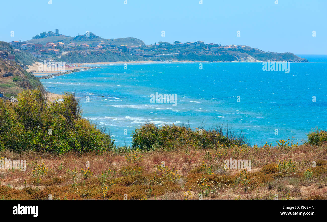 Paradise sea bay with azure water and beach. View from coastline, Torre di Gaffe, Agrigento, Sicily, Italy. Stock Photo
