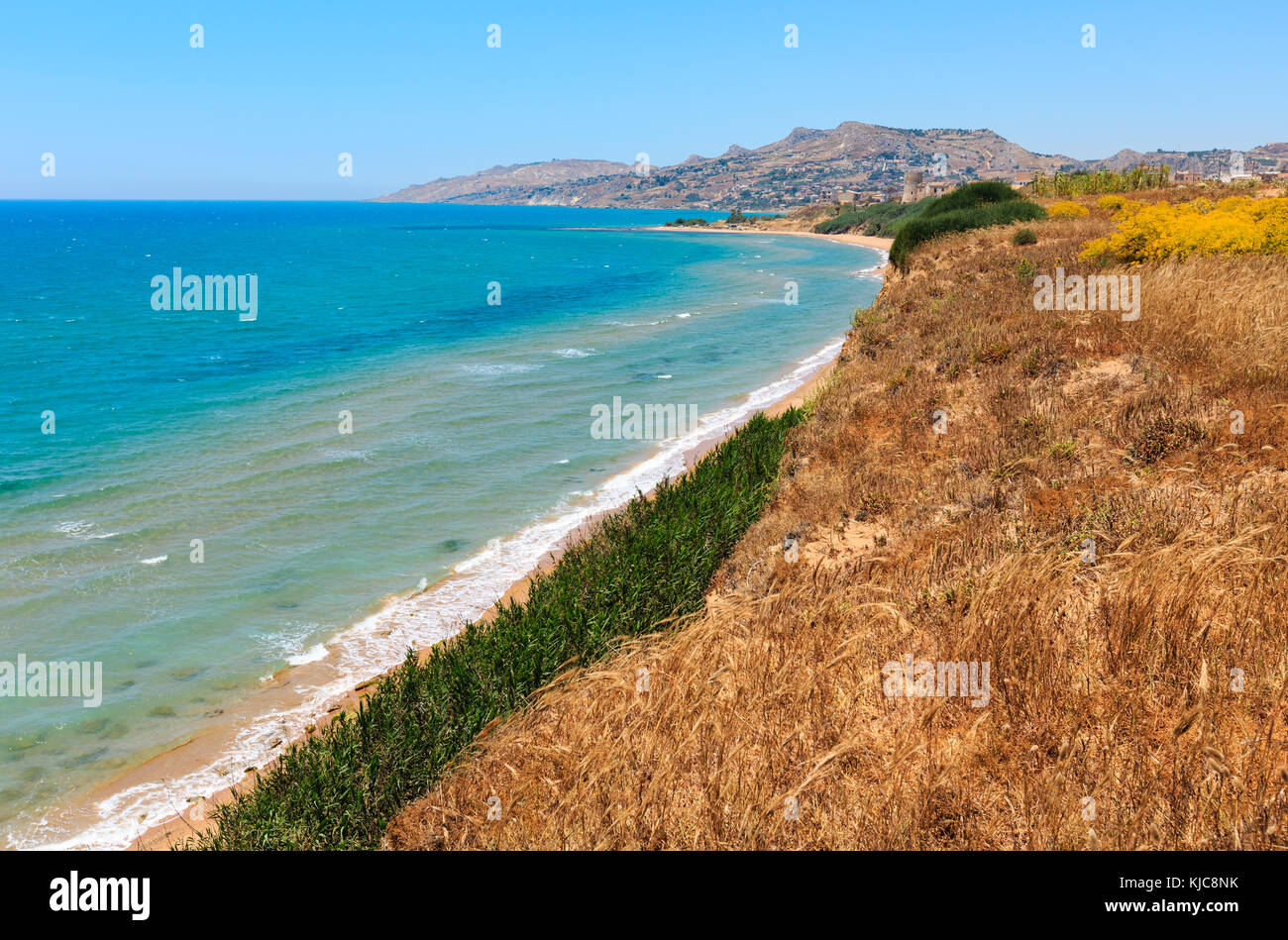 Paradise sea bay with azure water and beach. View from coastline, Torre di Gaffe, Agrigento, Sicily, Italy Stock Photo