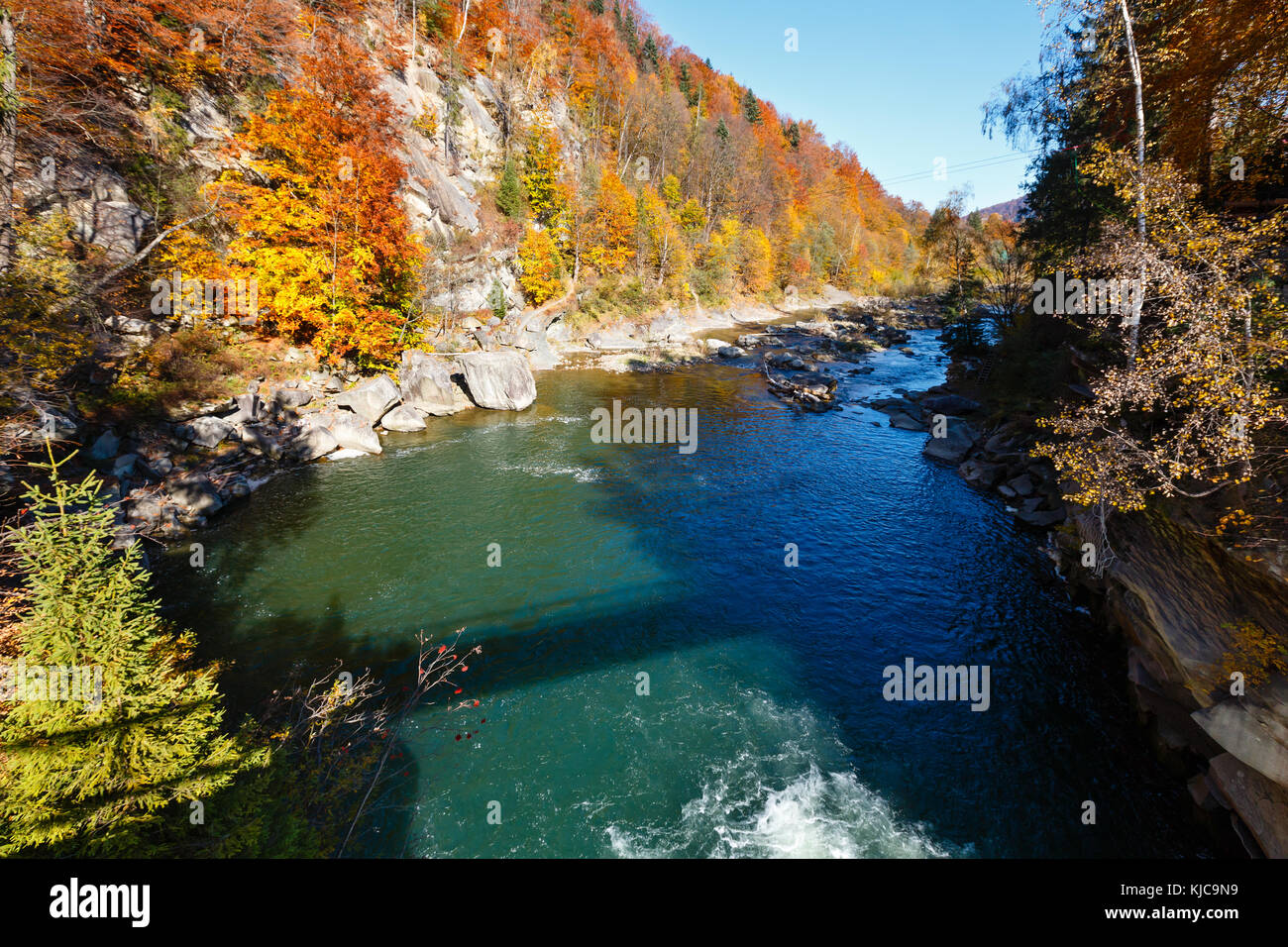 Prut River autumn landscape (Yaremche, Ivano-Frankivsk Oblast, Ukraine). View from bridge. Stock Photo