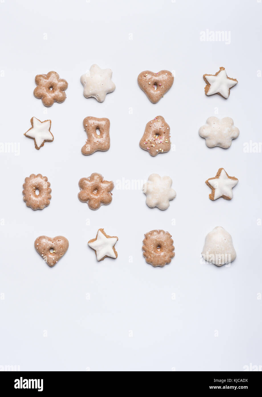 Christmas gingerbread layout on white desk background, top view. Flat ...