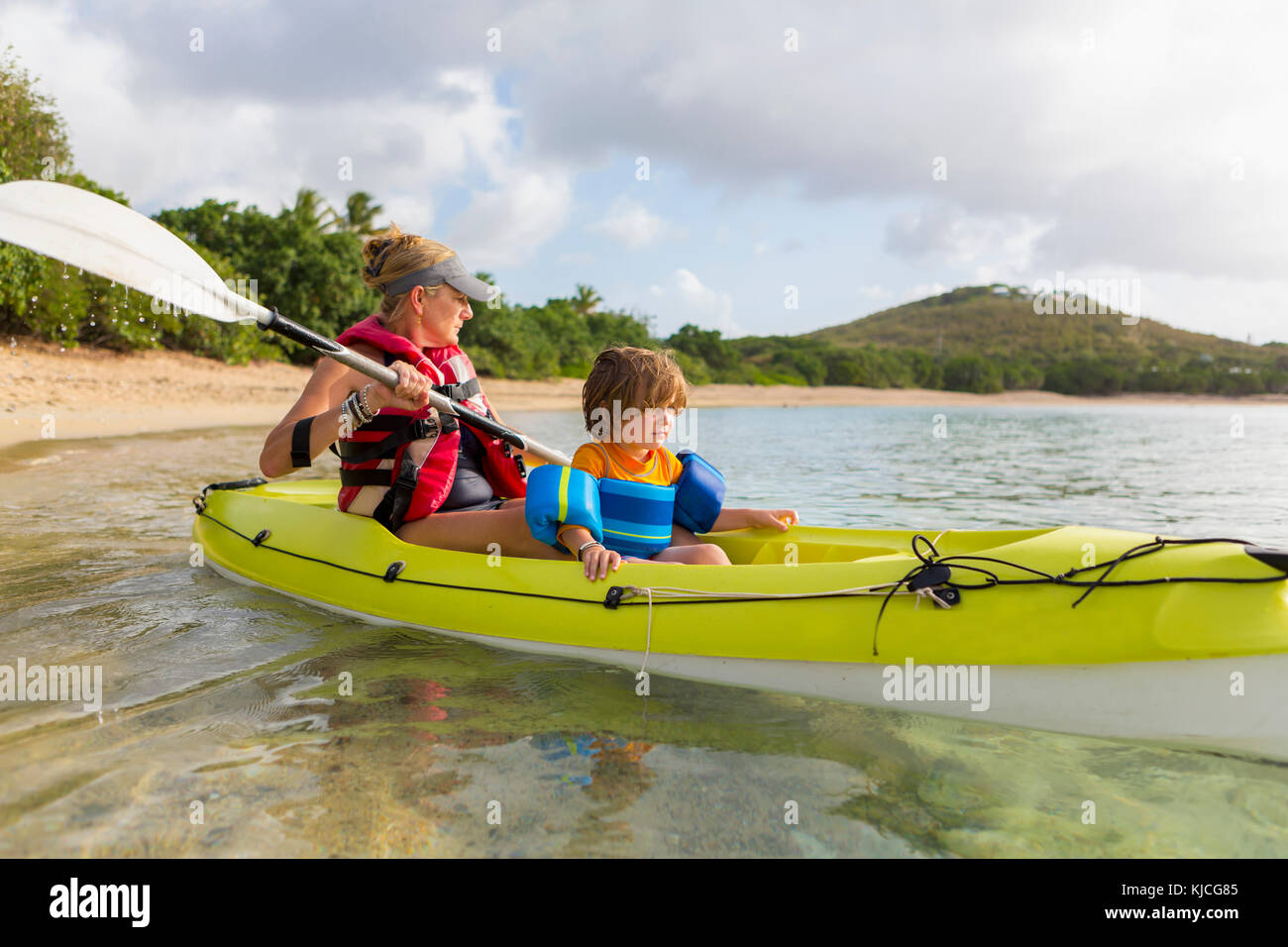 Caucasian mother and son in kayak Stock Photo