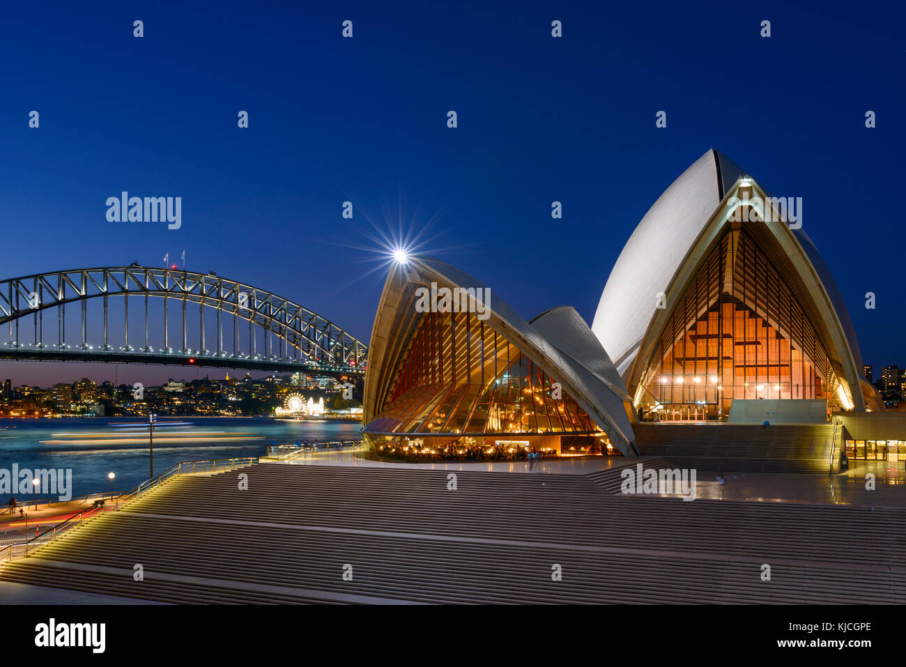 Panoramic View of the Sydney Opera House and Harbour Bridge at Night, Sydney, New South Wales Panoramic View of the Sydney Opera House and Harbour Bridge at Night, Sydney, New South Wales