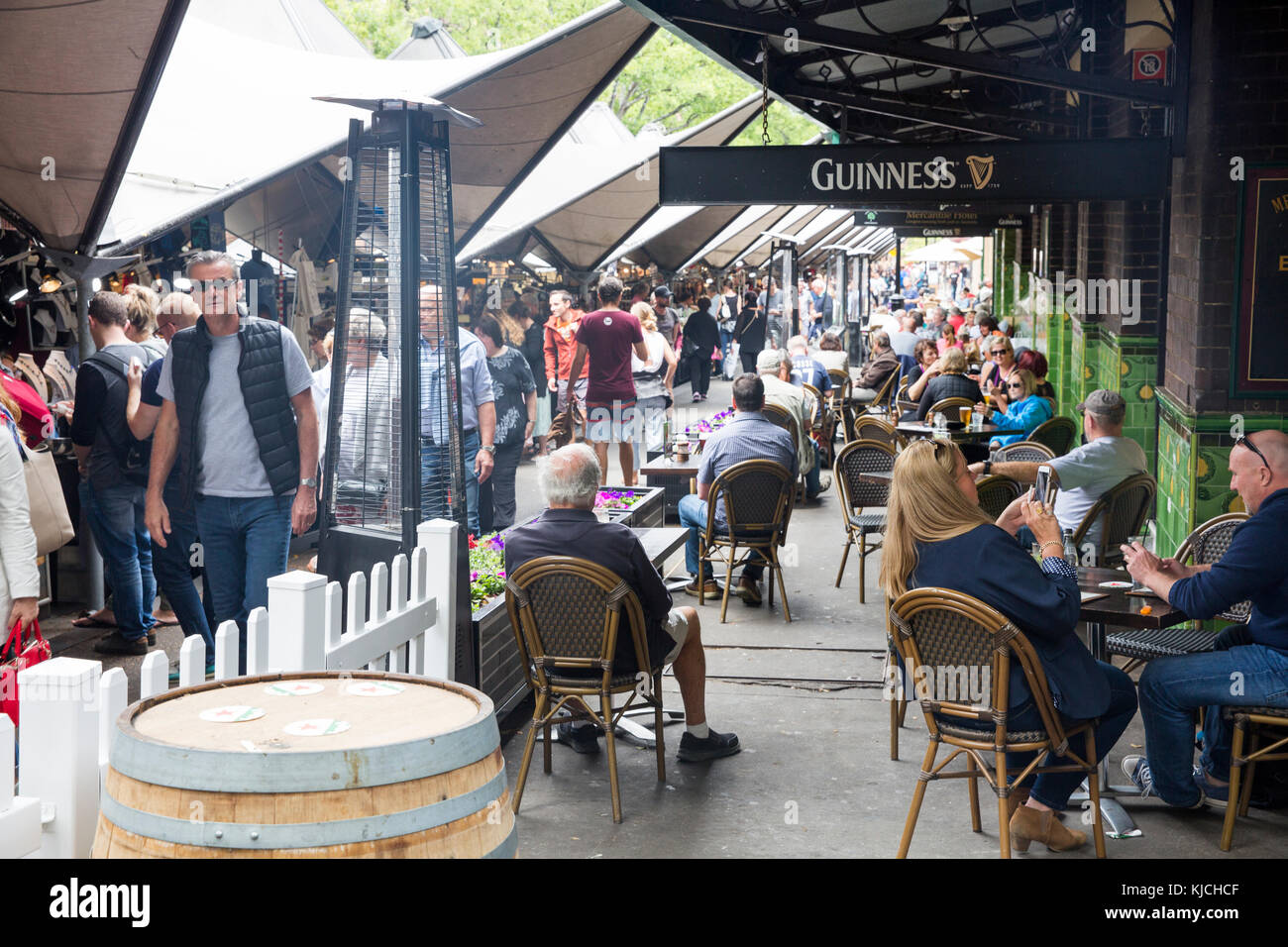 People enjoying a beer beside The Rocks markets at the Mercantile pub