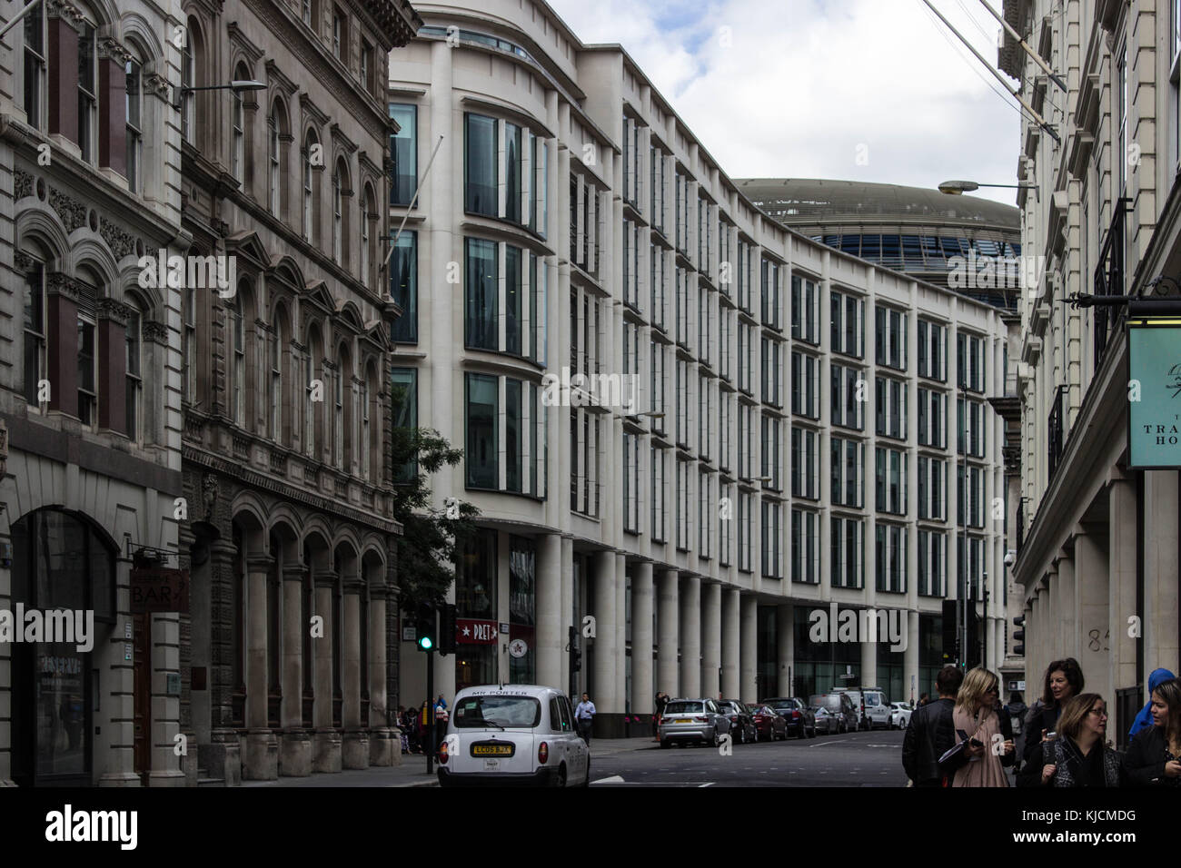 20 Gresham street building, with an unusual curved facade design and we can see a contrast between contemporary and old architecture, love this pic:) Stock Photo