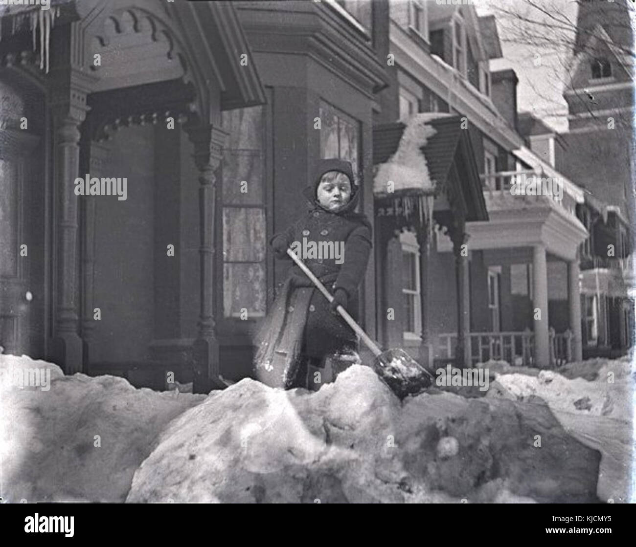 Child Shovelling Snow Ottawa 1905 Stock Photo Alamy