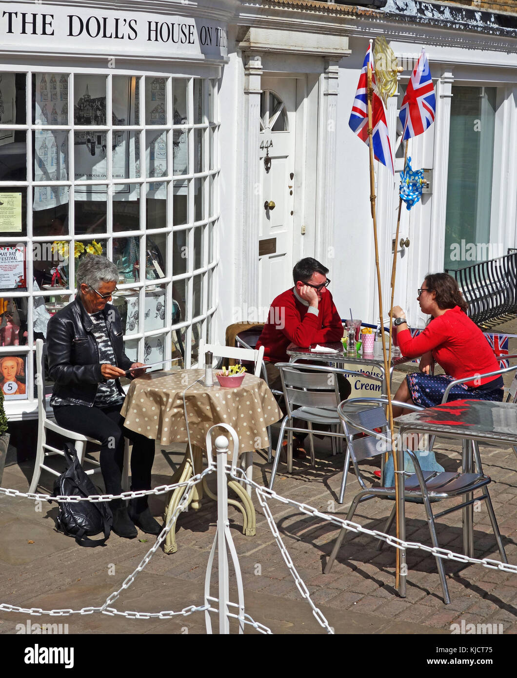 customers seated outside a street cafe in harrow, london, england, uk, Stock Photo