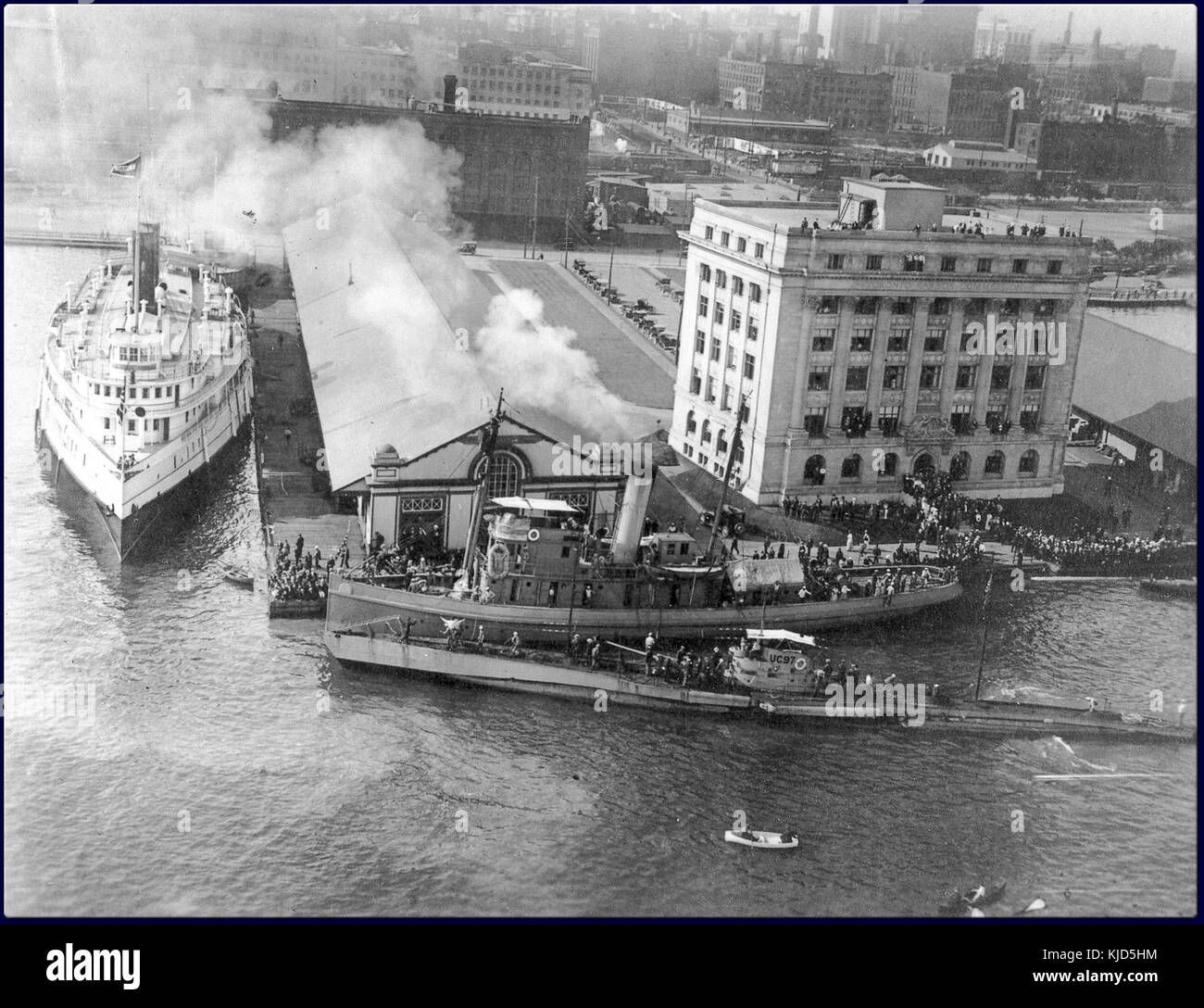 This photograph depicts the SM UC 97, a German submarine, taken in Toronto in 1919. The submarine was part of Germany's naval fleet during World War I, and its presence in Toronto is notable post-war. Stock Photo