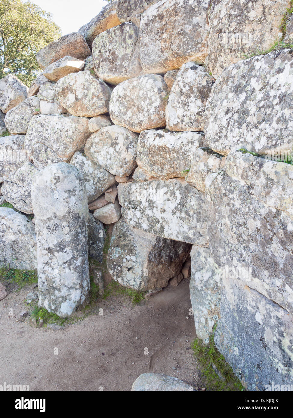 Nuragic prehistoric wall stone. Particular of giant tomb  with bethel in south sardinia Stock Photo