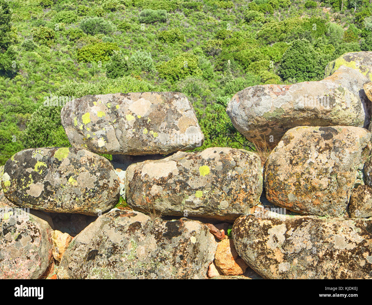 Nuragic prehistoric wall stone. Particular of giant tomb in south sardinia Stock Photo