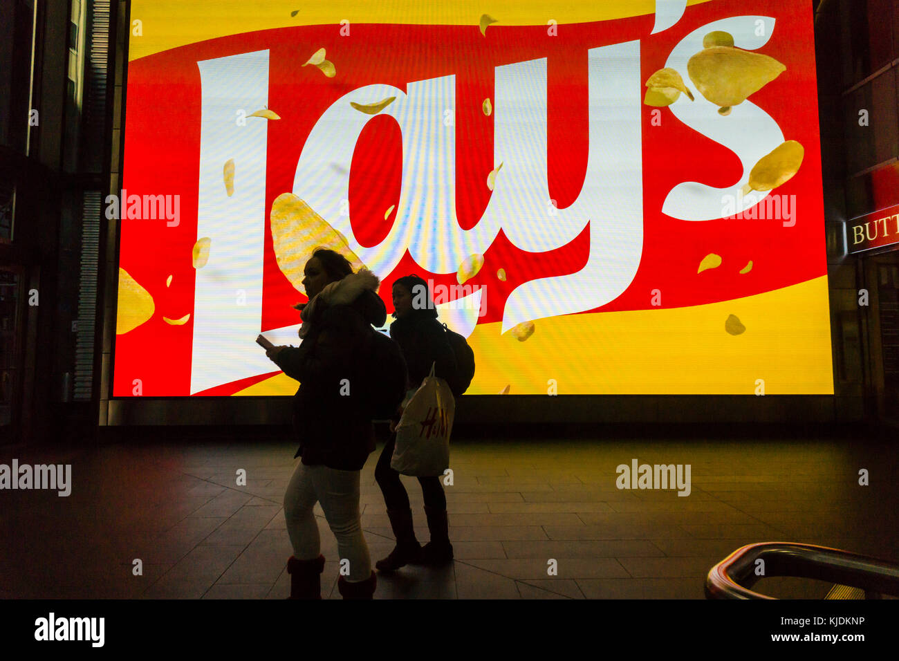 A giant display in the Fulton Center Transportation Hub advertises PepsiCo's Frito-Lay brand potato chip snacks in New York on Sunday, November 19, 2017. (© Richard B. Levine) Stock Photo
