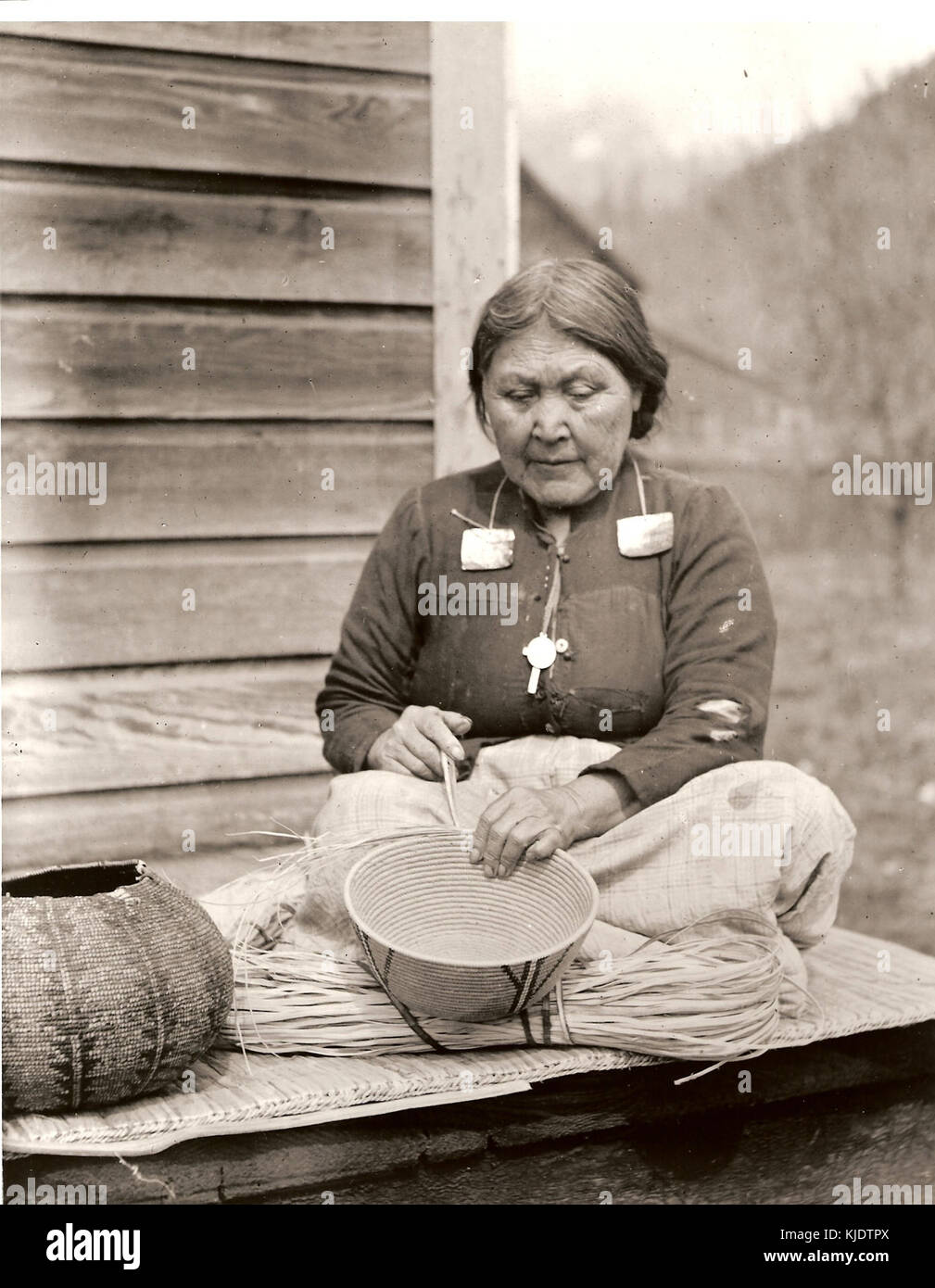 Stoler Ladies Stolo woman with cedar basket Stock Photo - Alamy