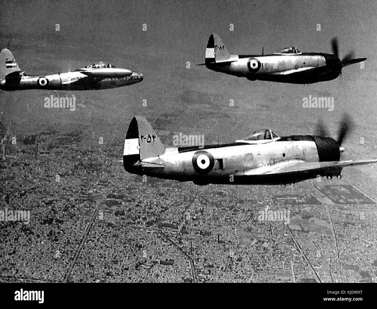 F 84 Thunderjet and two P 47 Thunderbolts formation comparison flight Stock Photo