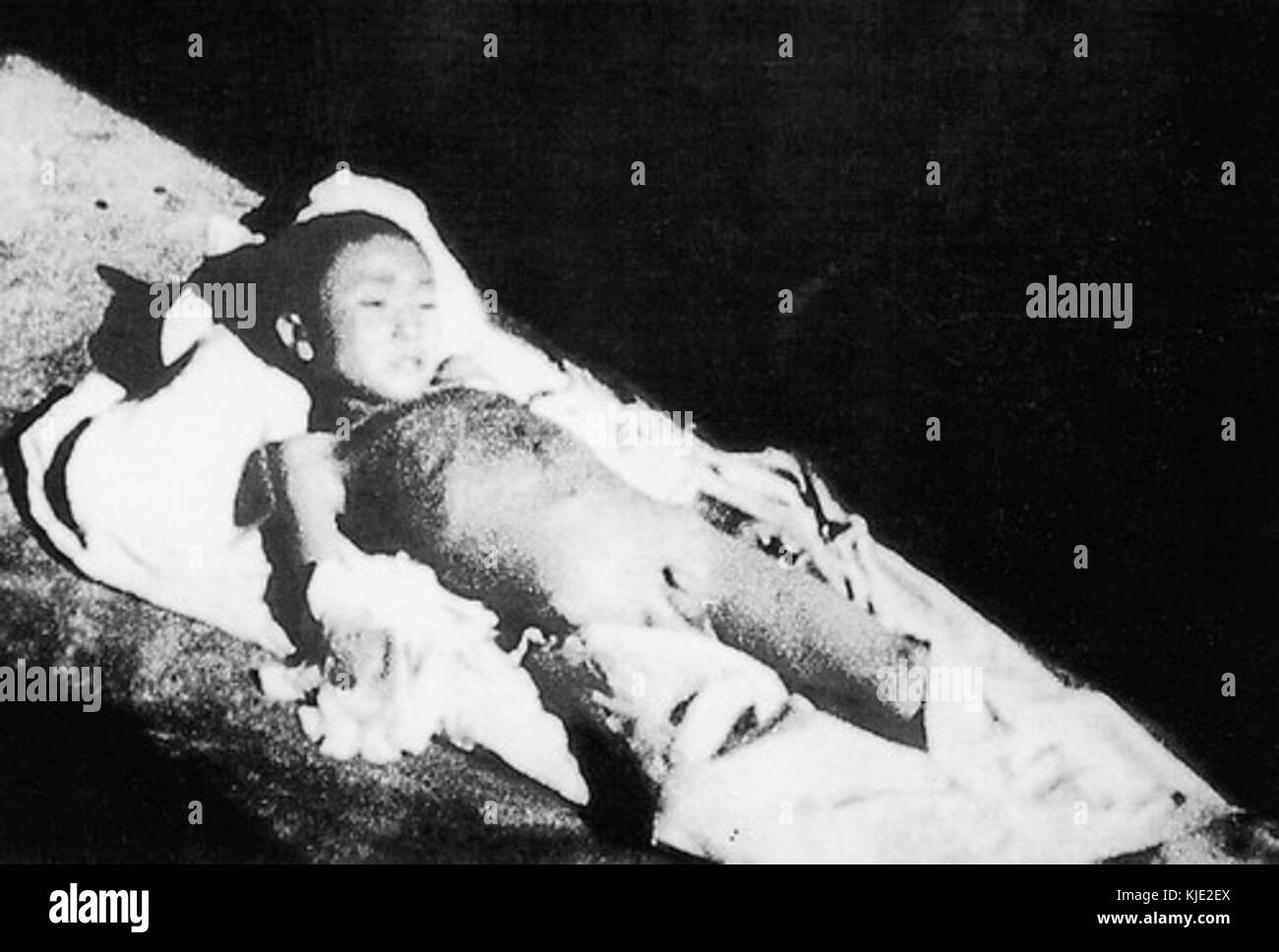 A seven year old child bayoneted dead by Japanese in Nanjing Massacre Stock Photo