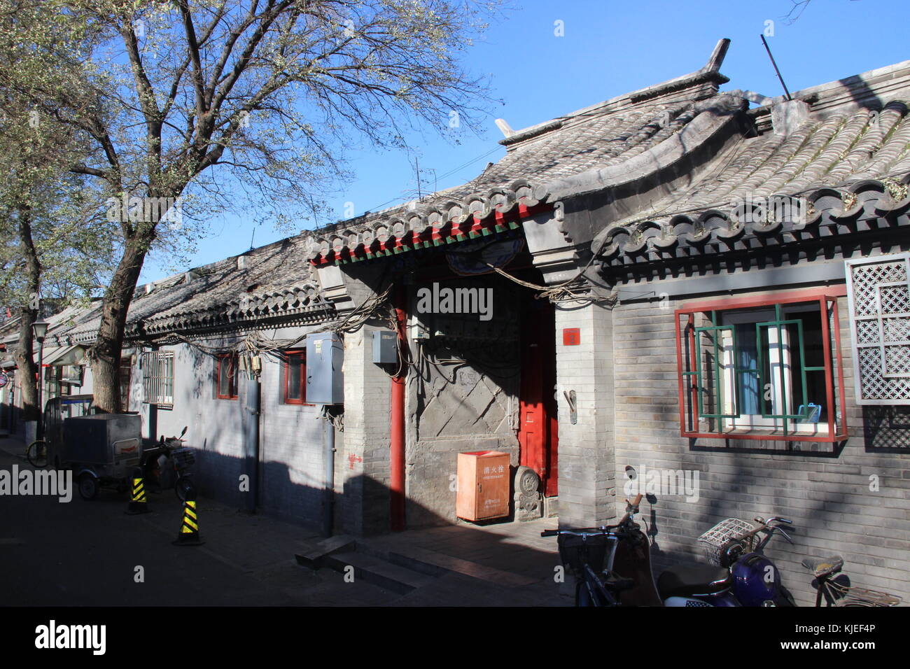 Traditional Chinese alleys, dwellings and shops - Beijing, China Stock Photo